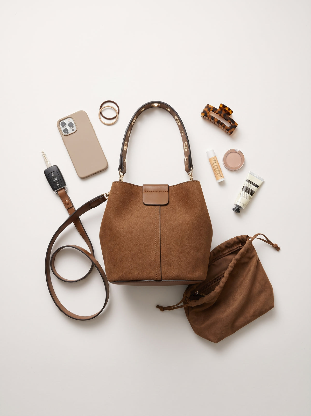 Bucket Bag — Inner Bag & Essentials Flat Lay | Generated by Modelize