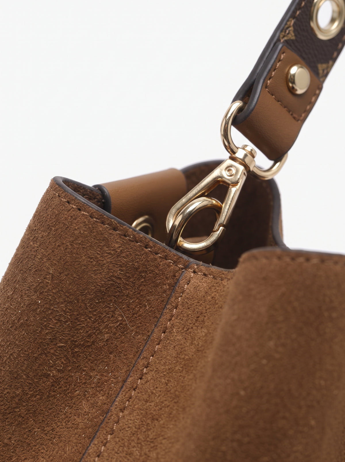 Bucket Bag — Suede & Grommet Detail Macro | Generated by Modelize
