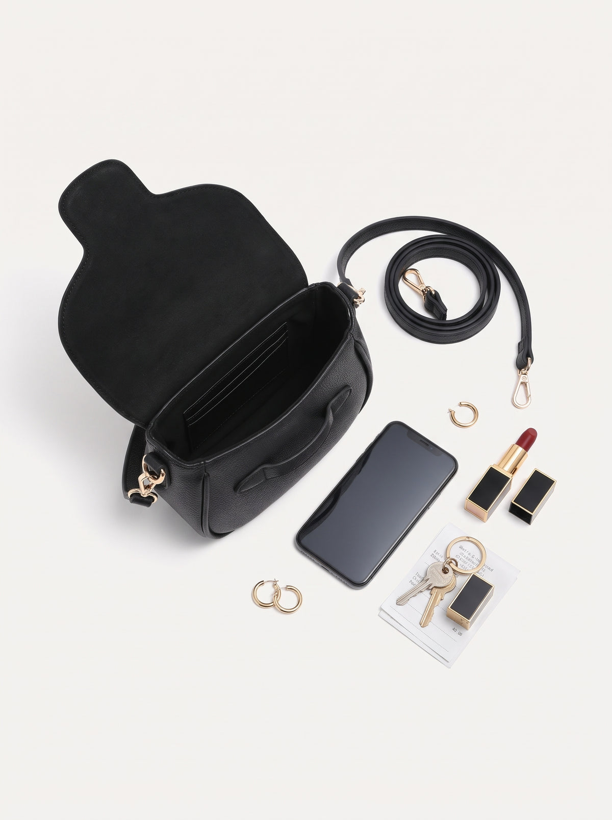 Crossbody Bag — Open Flap Flat Lay | Generated by Modelize